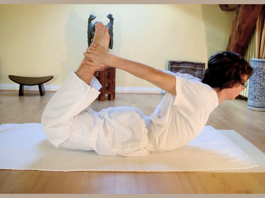 Bow Pose (Dhanurasana) — photograph