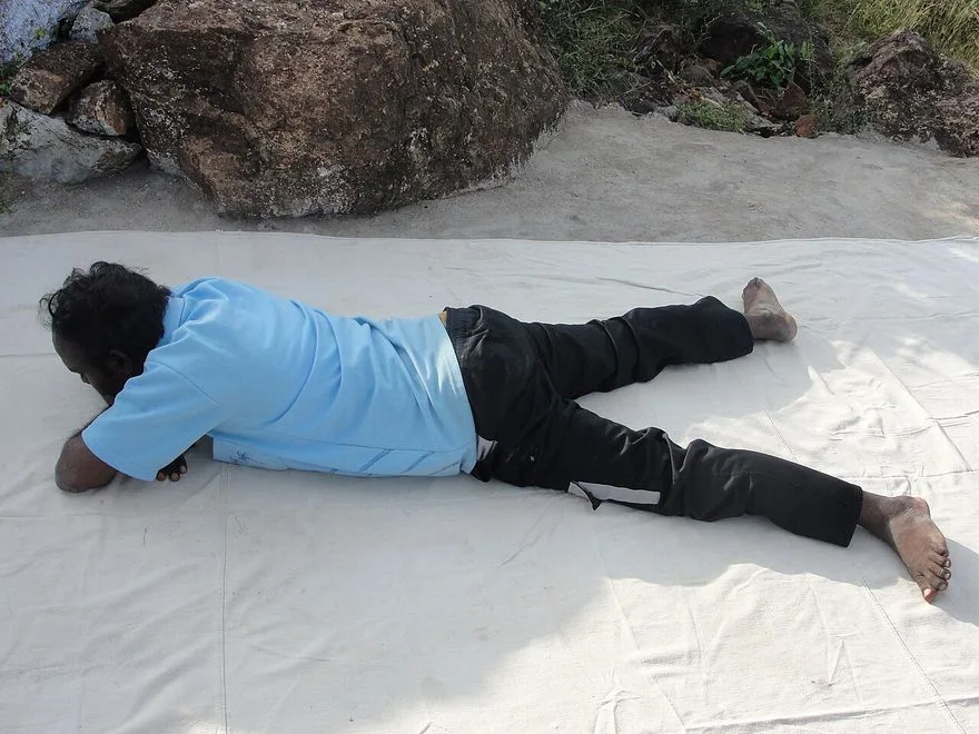 Crocodile Pose (Makarasana) — photograph