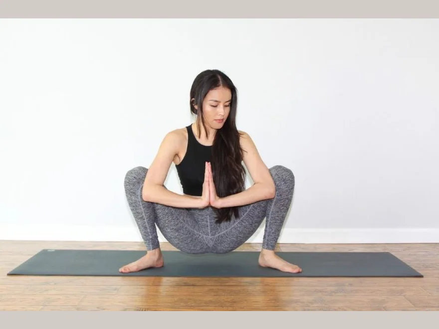 Garland Squat (Malasana) — photograph