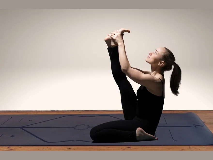 Heron Pose (Krounchasana) — photograph