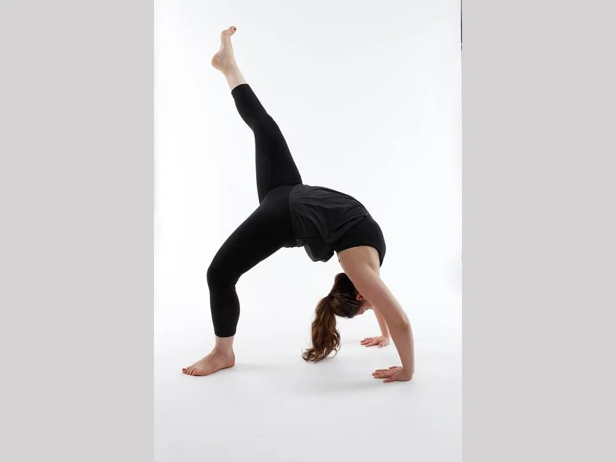 One-Legged Wheel (Eka Pada Urdhva Dhanurasana) — photograph