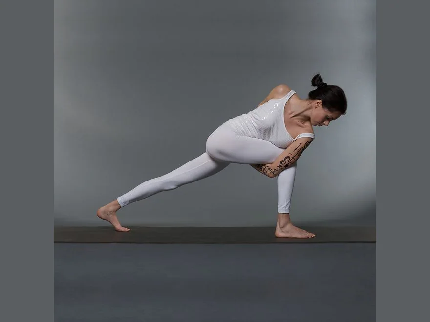 Revolved Side Angle (Parivrtta Parsvakonasana) — photograph