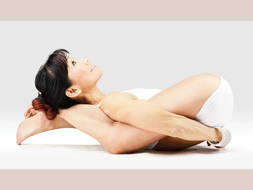 Yogic Sleep Pose (Yoga Nidrasana) — photograph